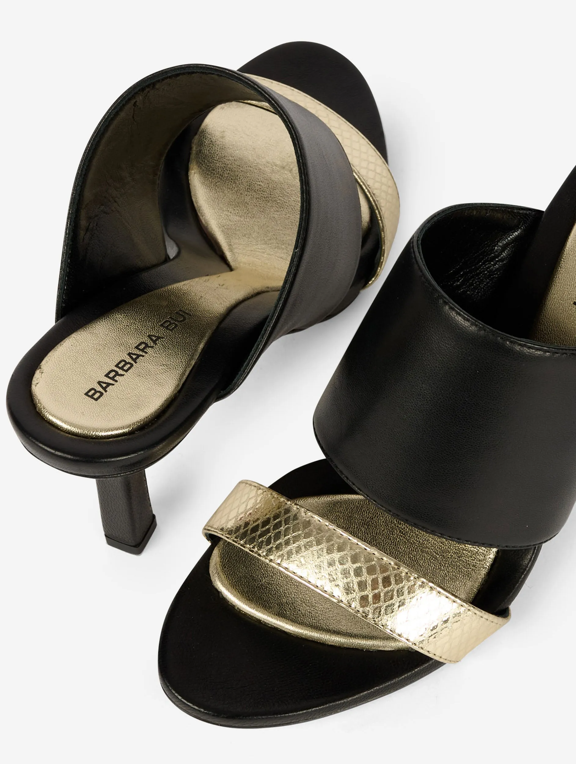 Mules à talon en cuir noir et or